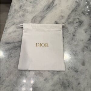 Dior Cream Drawstring Pouch
